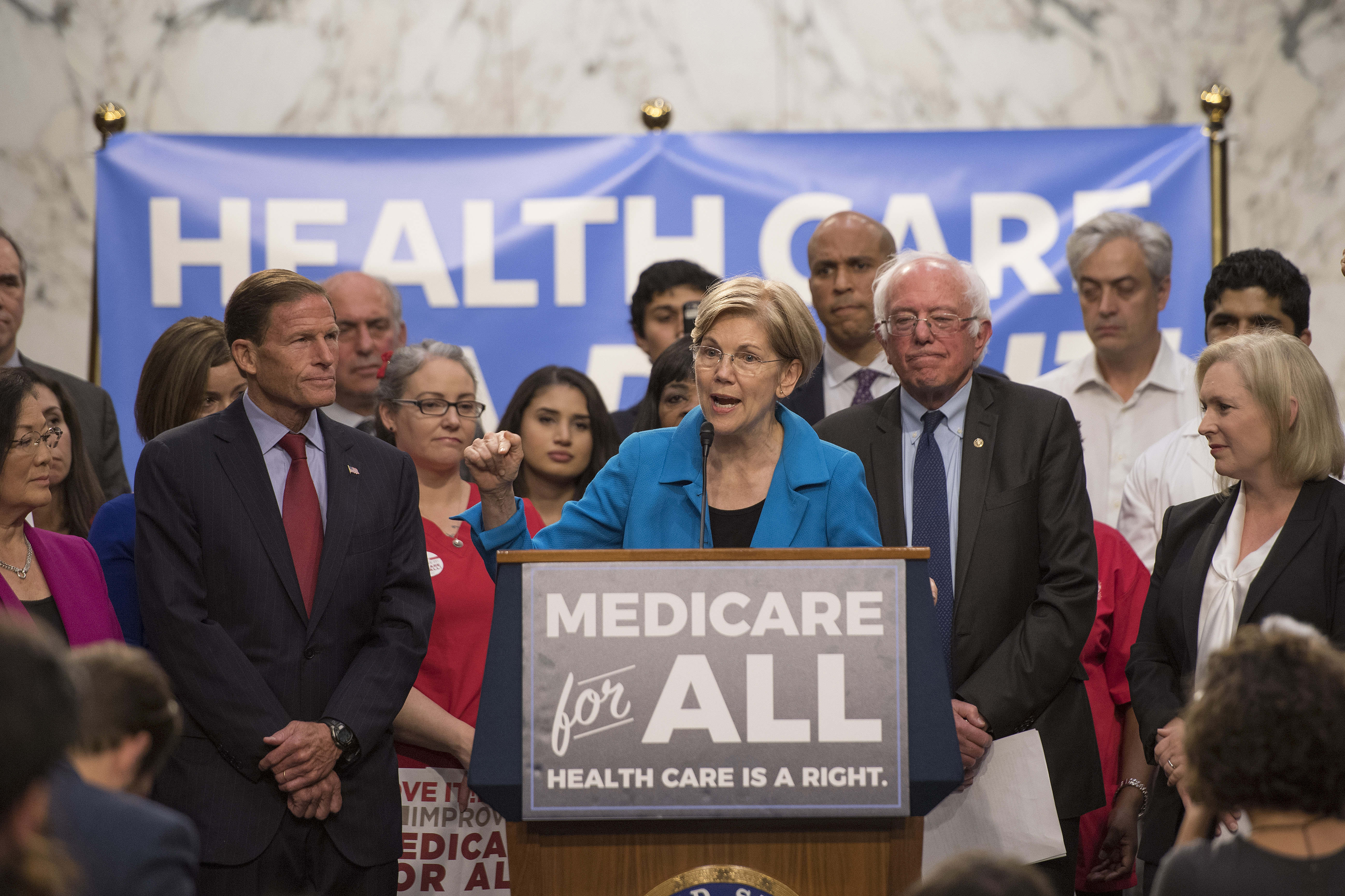 Sen. Elizabeth Warren and Sen. Bernie Sanders speak about health care.