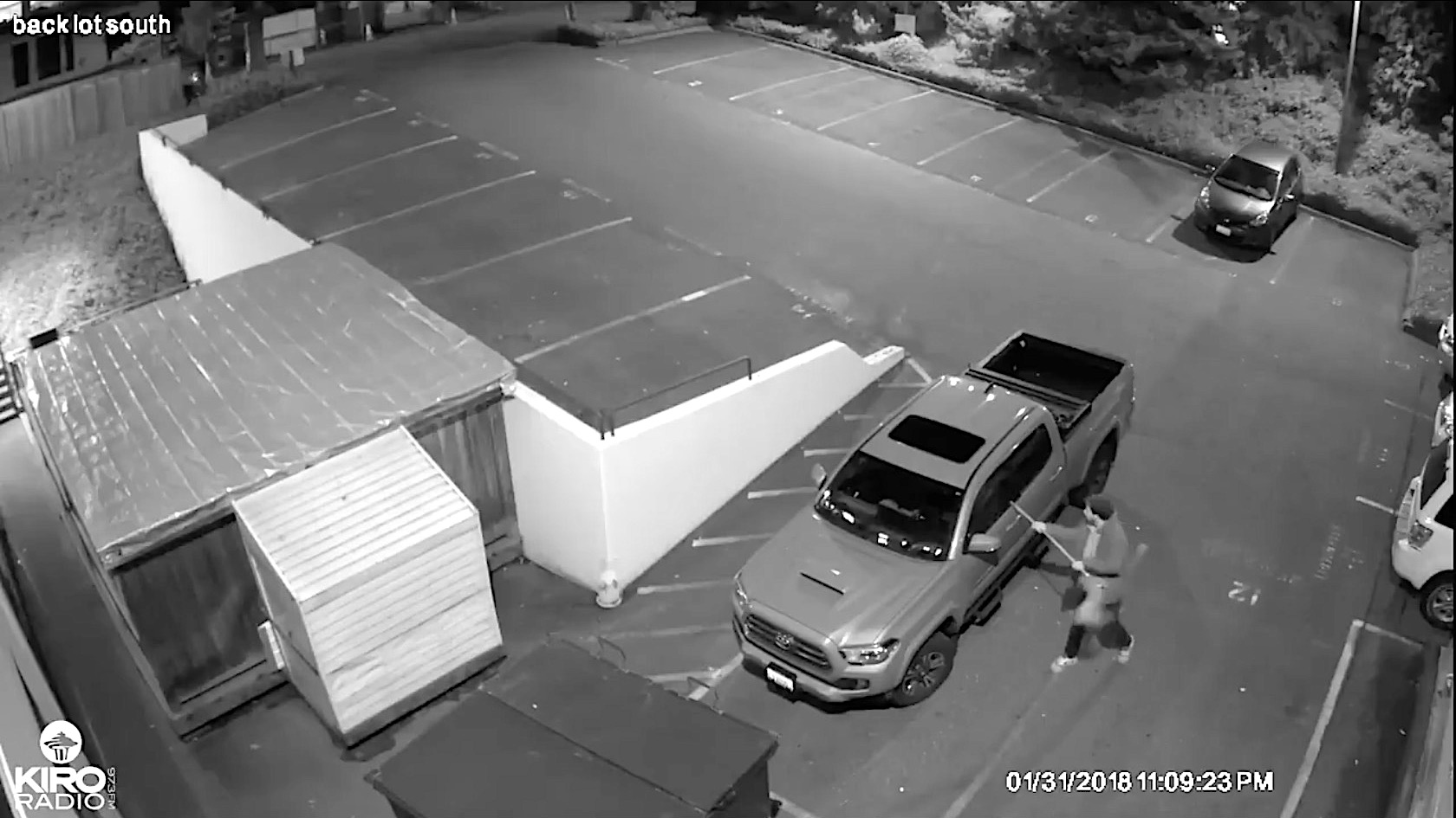 A vandal tries to break into a truck at KIRO radio