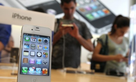 The Apple iPhone 4S is displayed on Oct. 14, 2011: Apple is expected to debut its next generation iPhone on Sept. 12.