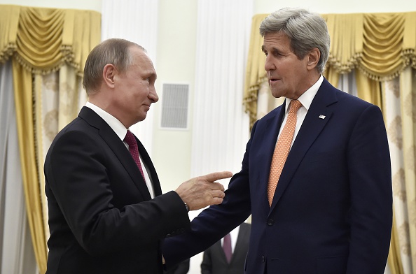 Putin skeptical about Kerry carrying his own luggage. 