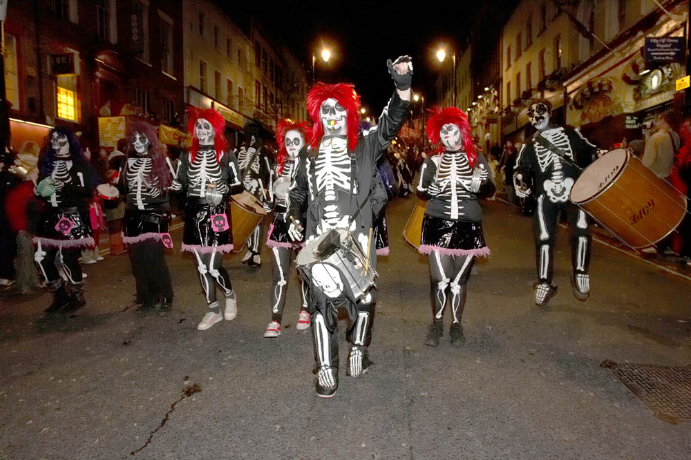 Skeletons march in the carnival parade in Derry.