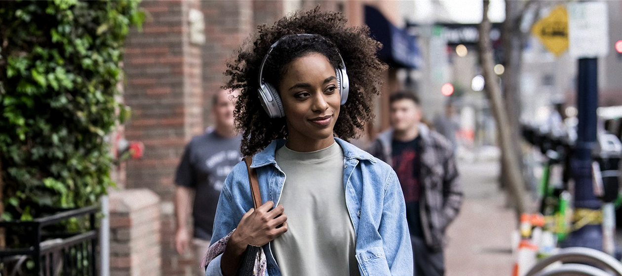 A woman with headphones.