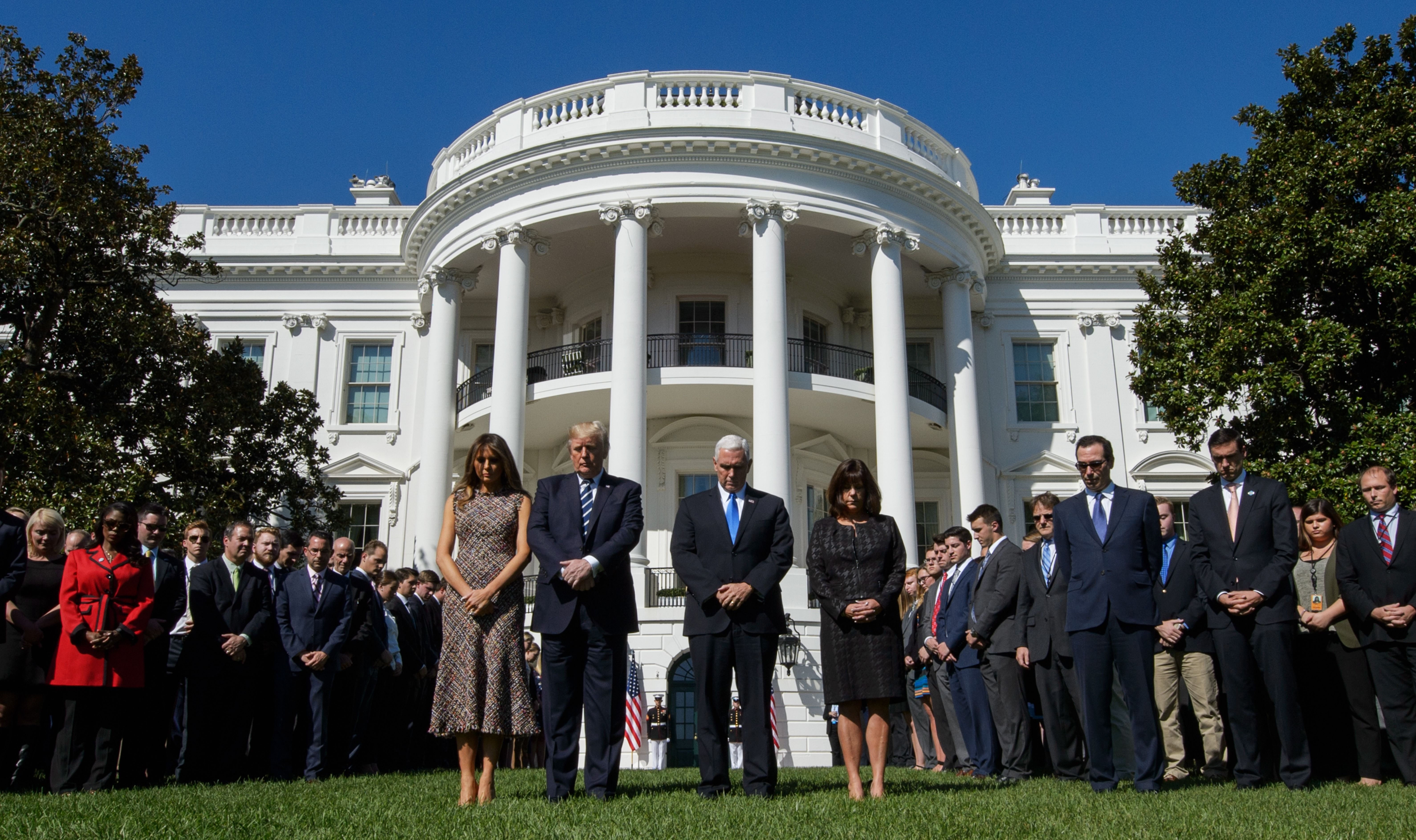 The White House holds a moment of silence on the South Lawn for the victims of the Las Vegas shooting.