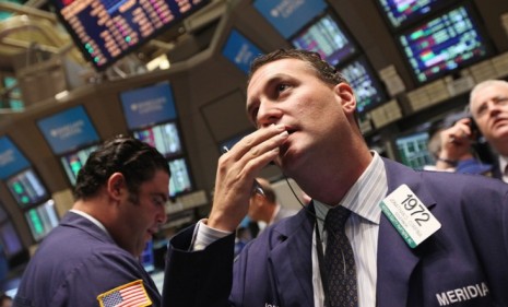 Monitors on the floor of the New York Stock Exchange