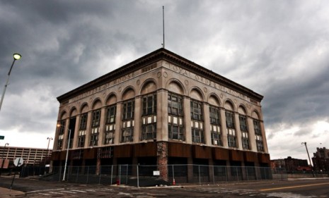 A vacant building sits on an empty street corner in Detroit&#039;s Greektown: One-fourth of the Motor City&#039;s residents left town in the last 10 years. 