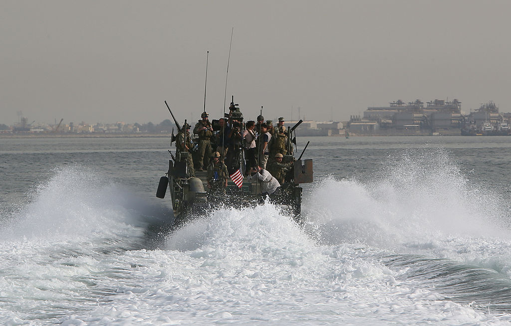 A U.S. Navy Riverine boat travels near Bahrain