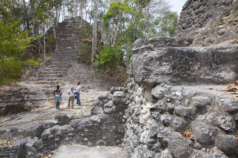 An archaeologist guides visitors to the top of La Danta in Guatemala.