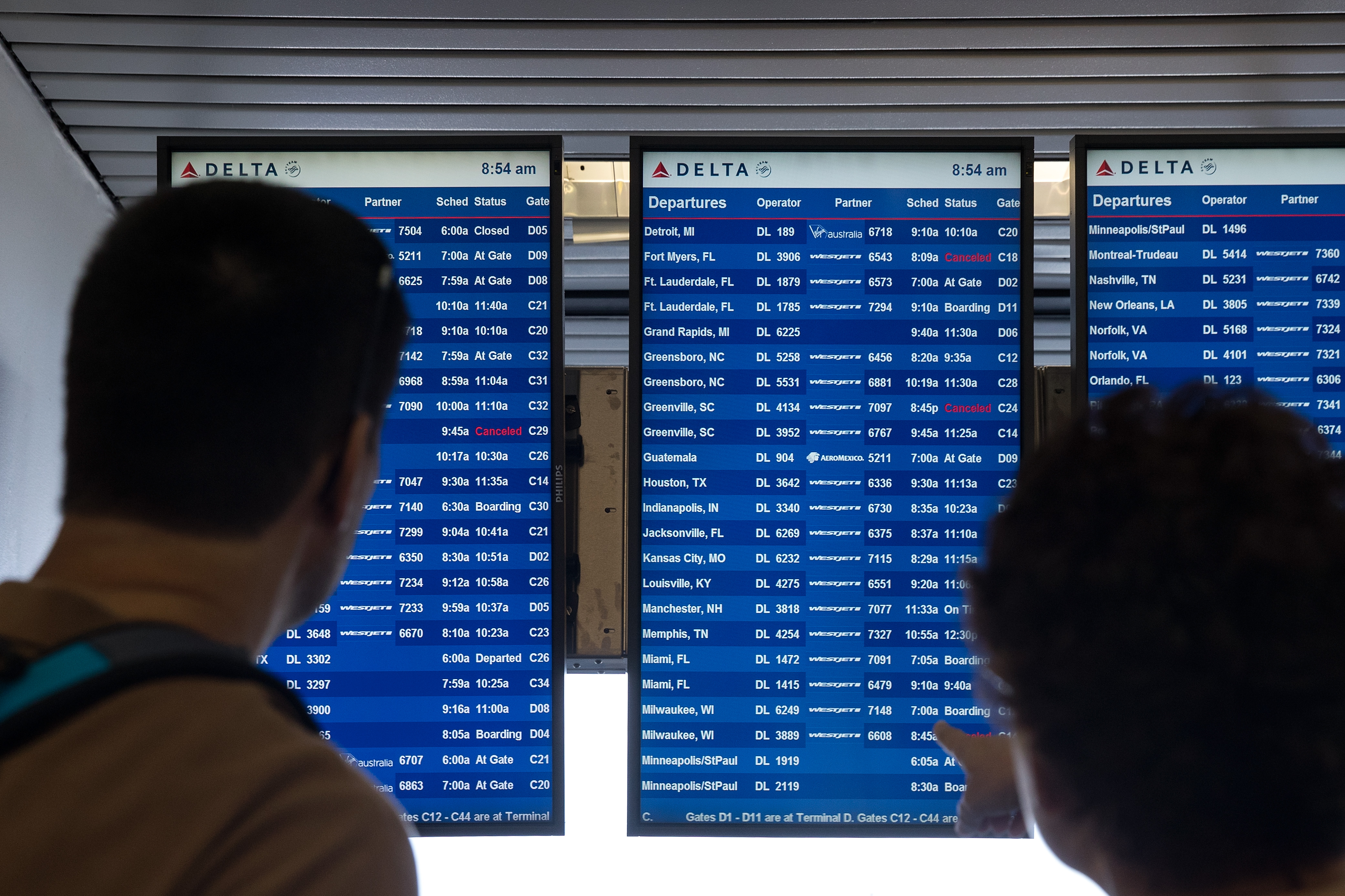 The Delta departures list at LaGuardia Airport