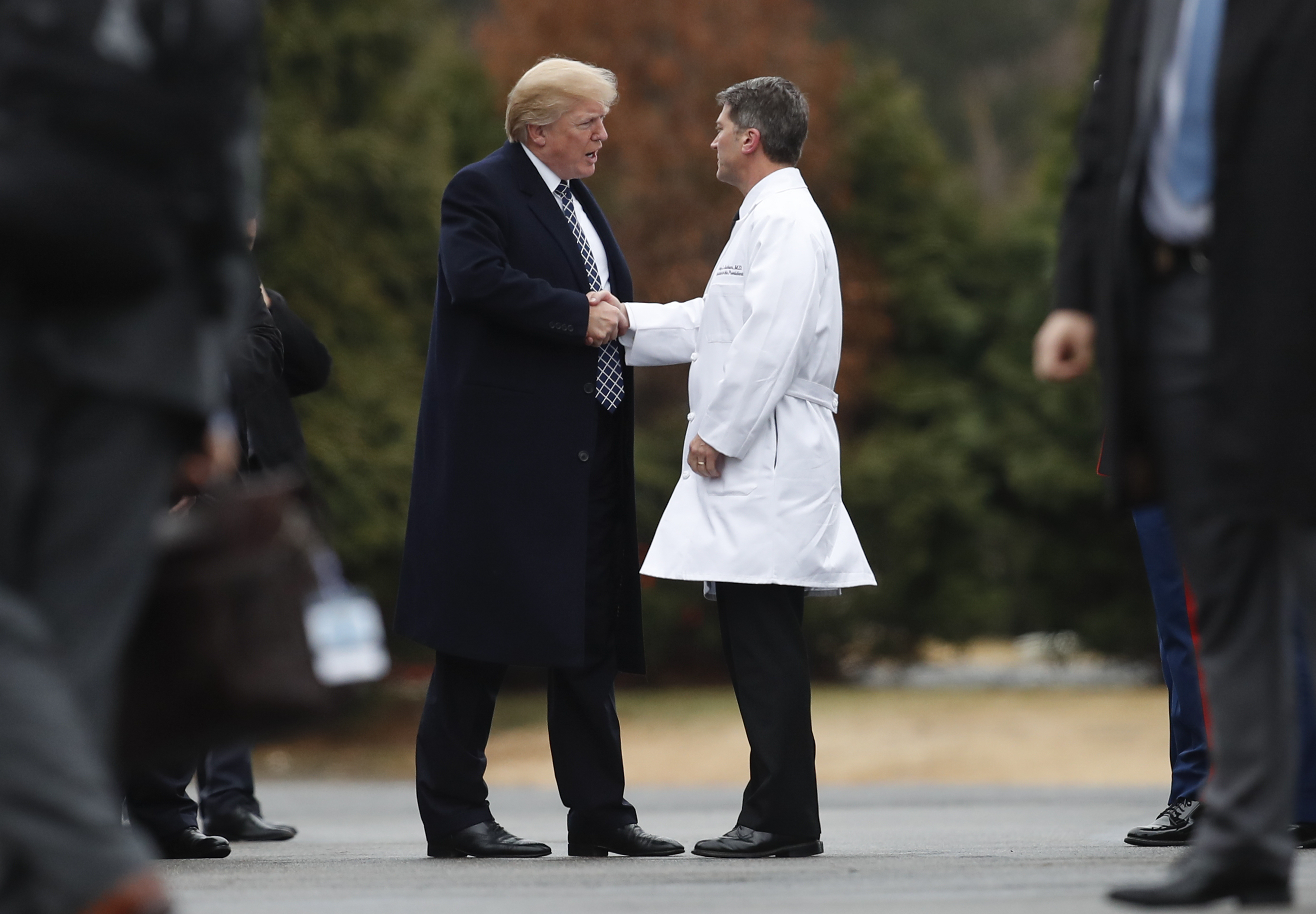 President Donald Trump shakes Dr. Ronny Jackson&#039;s hand.