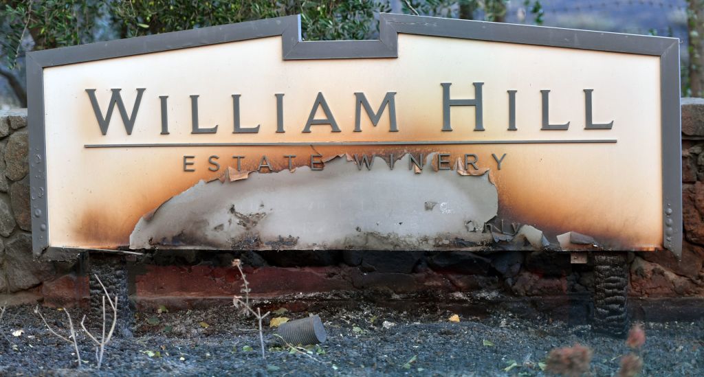 The partially destroyed William Hill Estate Winery sign.