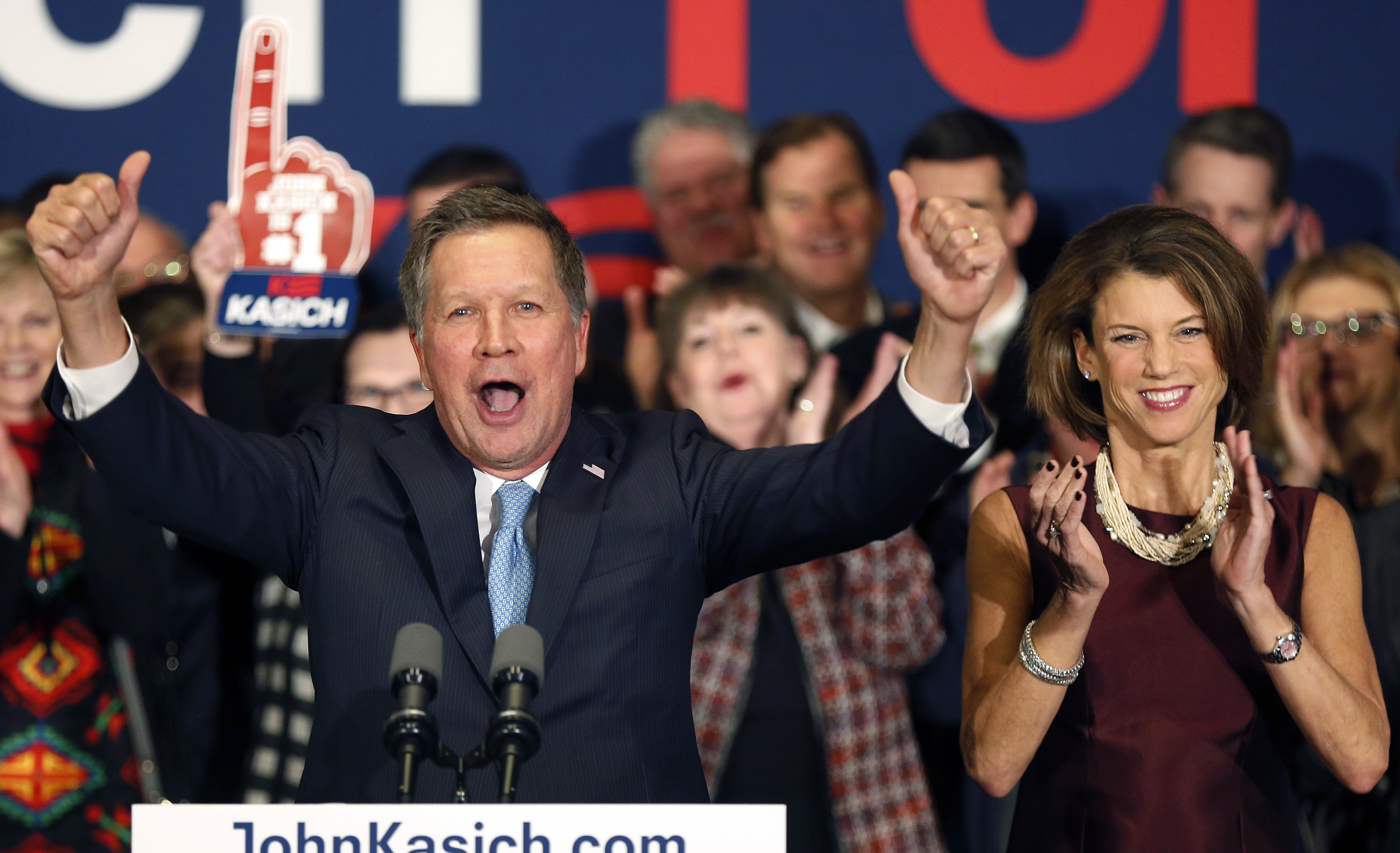 John Kasich coming up from behind.