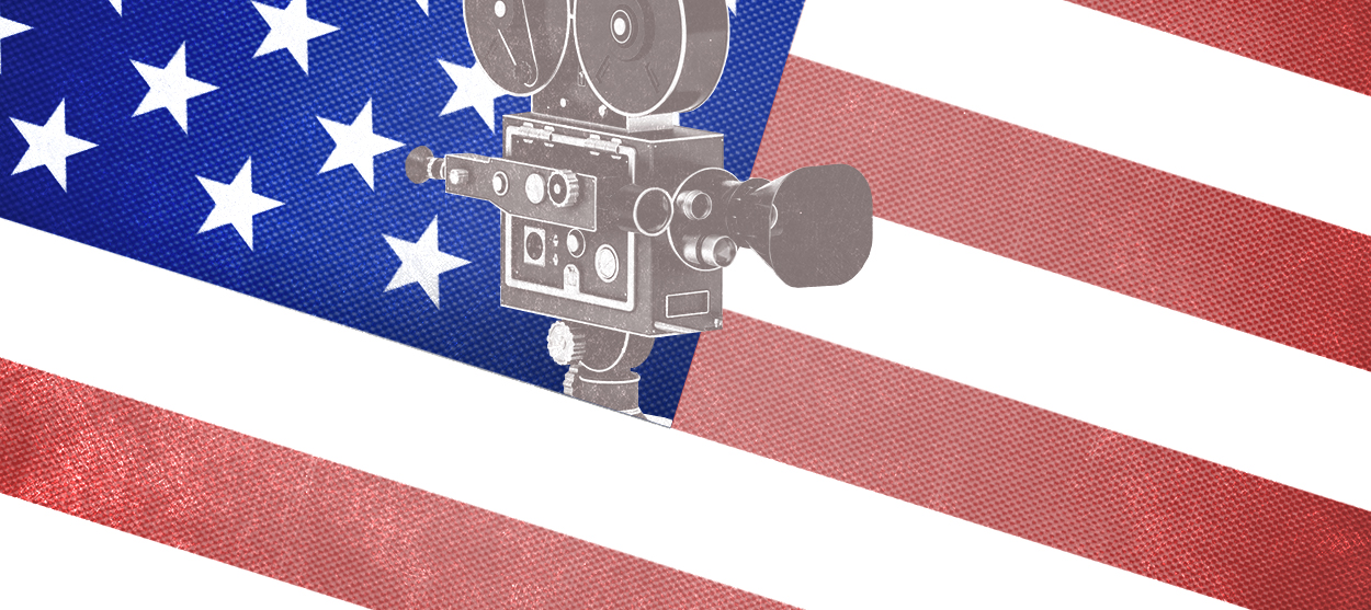 A movie camera and an American flag.