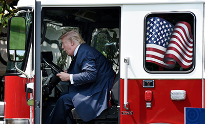 President Trump in a fire truck!