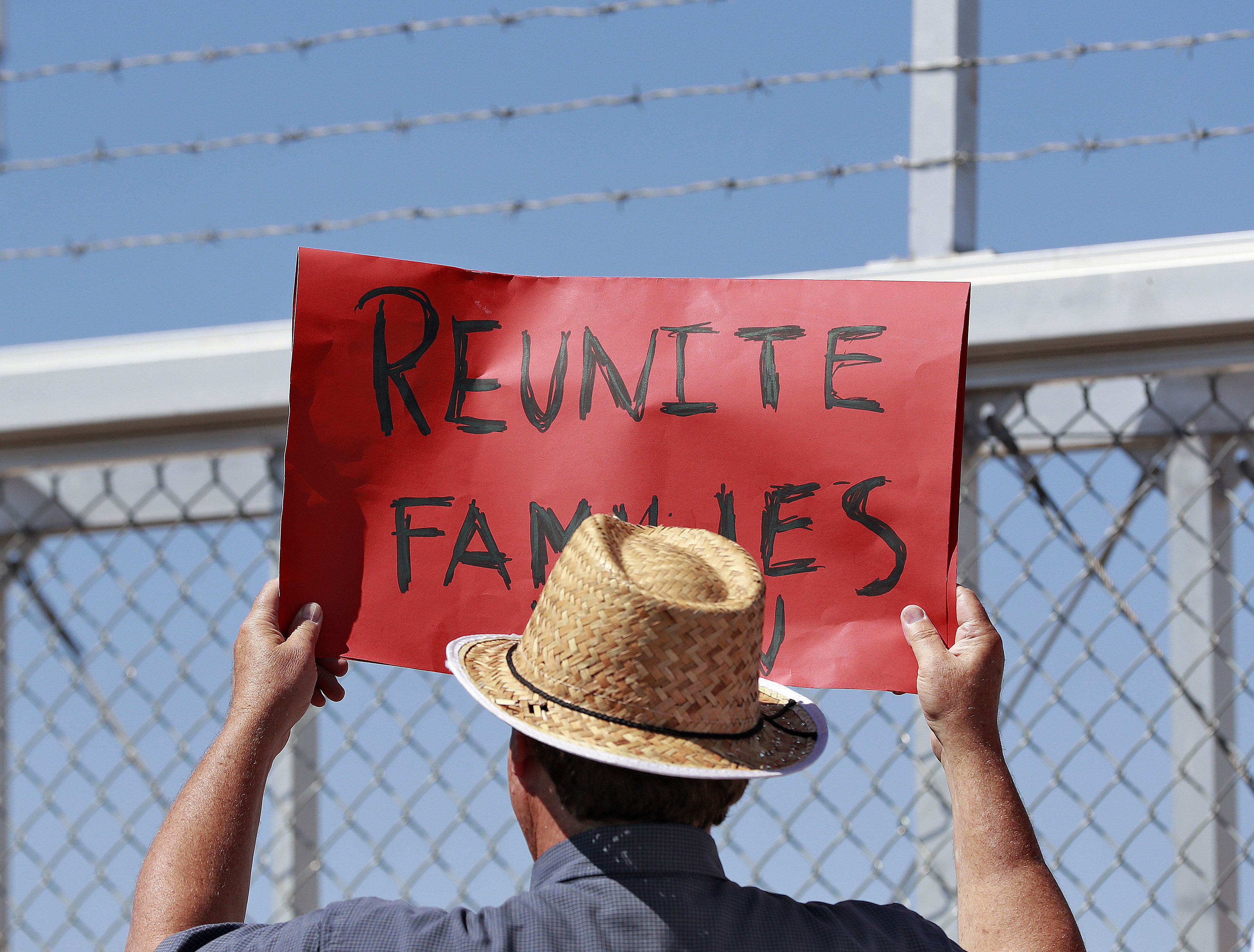 A protester outside the Port of Entry in Fabens, Texas