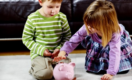 If kids came with a piggy bank maybe it would alleviate their expensive price tag, which can reach up to $200,000 by the time they turn 18.