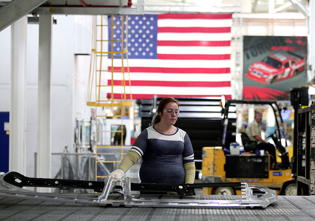 A worker at a car factory.