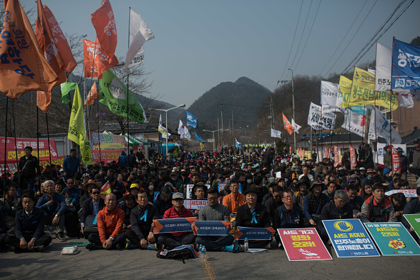 Protesters in South Korea against the THAAD system.