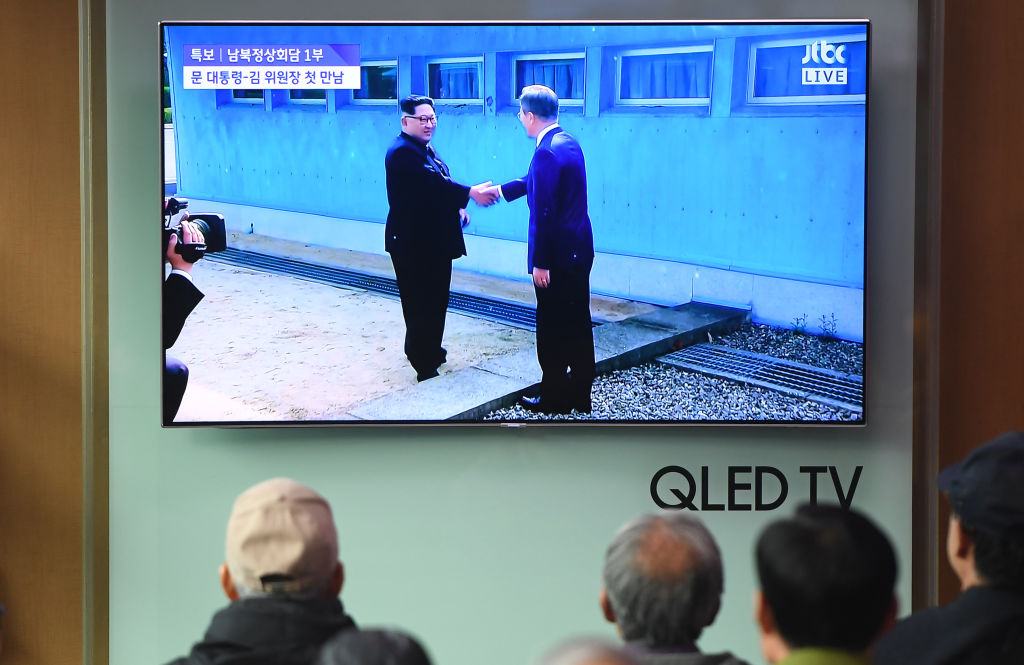 South Koreans watch on TV as Moon Jae-in meets Kim Jong Un.