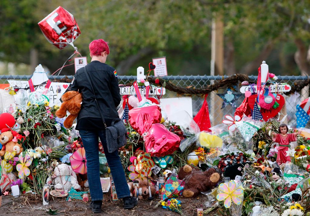 A student looks at a memorial to those killed at Marjory Stoneman Douglas High School last month.