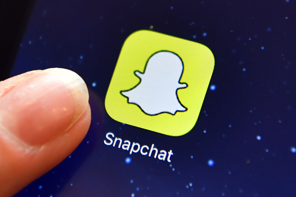 Snapchat logo on phone screen. 