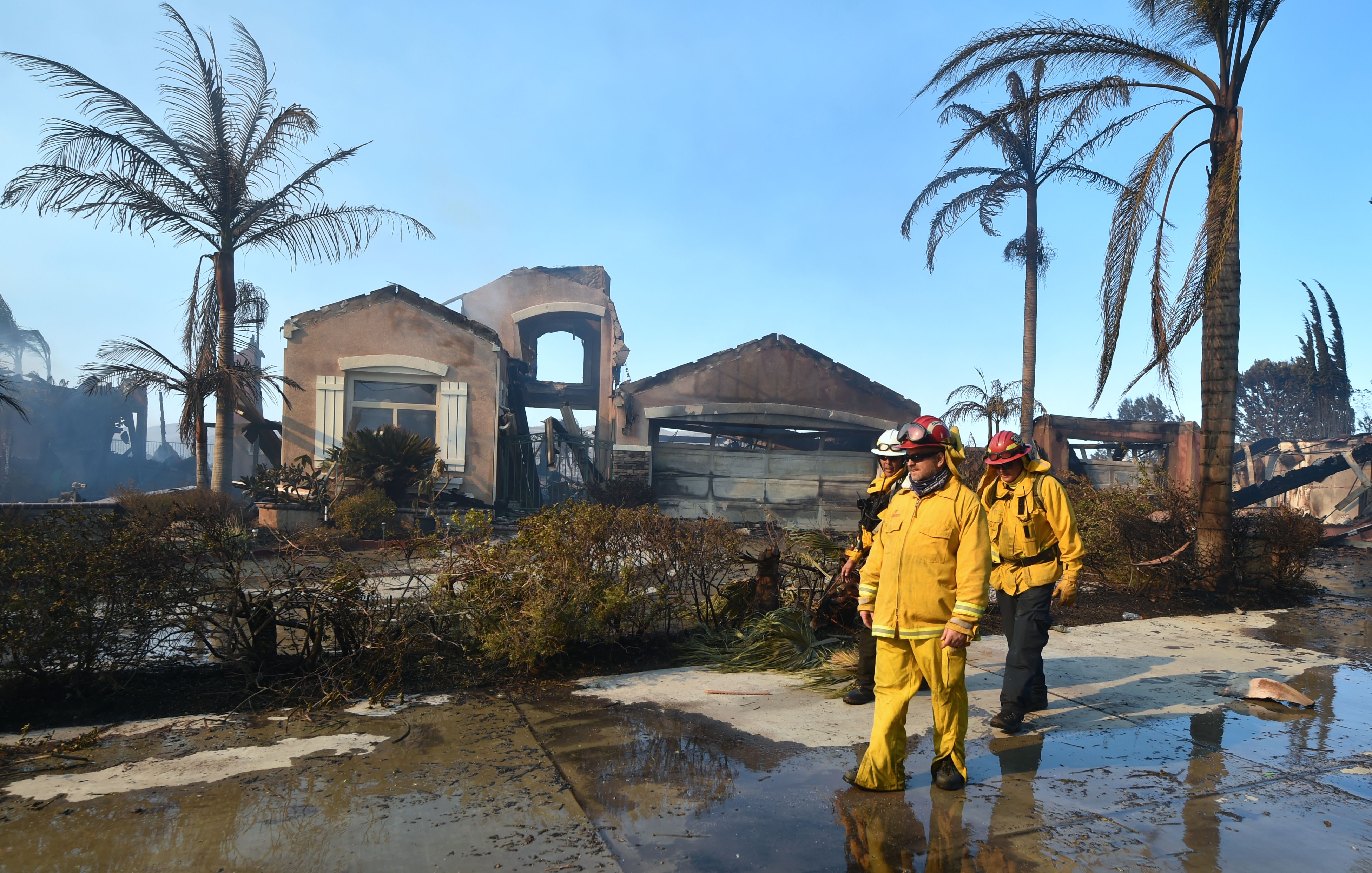 Homes are destroyed by fires in California