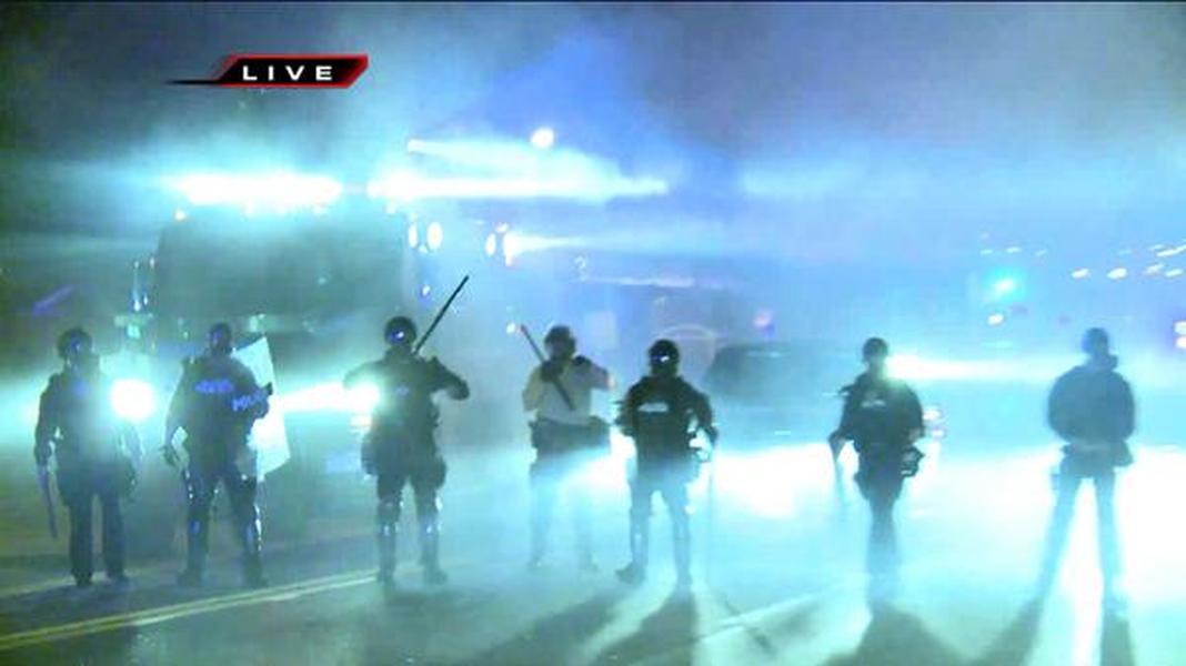 Police fire tear gas during another night of protests in Missouri