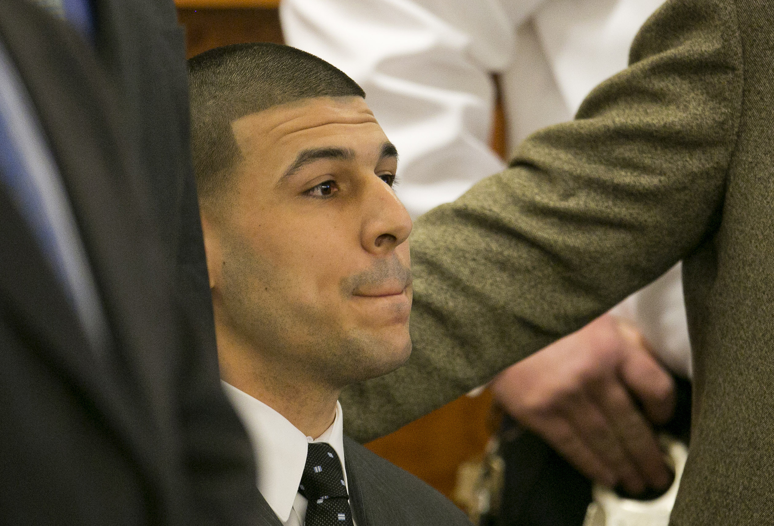 Hernandez listens to the verdict being read.