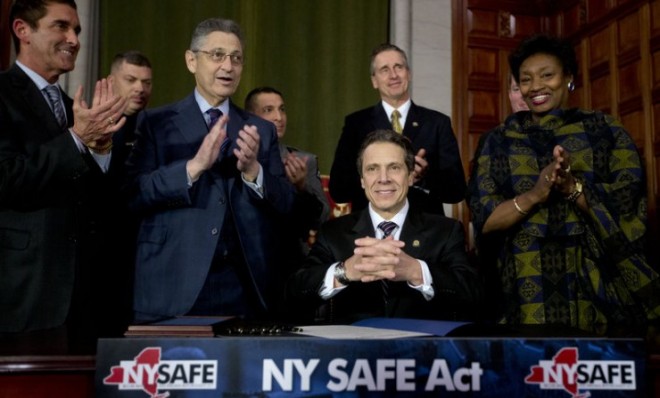 New York Gov. Andrew Cuomo and legislative leaders applaud after Cuomo signed New York&#039;s Secure Ammunition and Firearms Enforcement Act into law on Jan. 15.