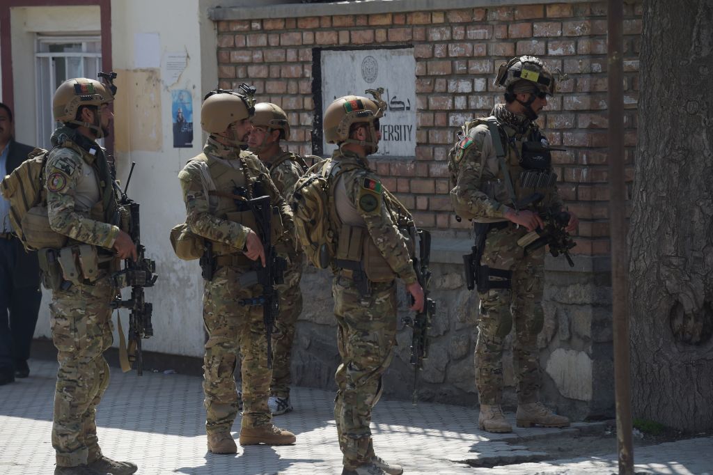 Afghan forces after a suicide bombing in Kabul