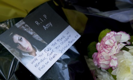 A memorial to Amy Winehouse outside her London home: While many suspected it was drugs and alcohol that caused the singer&#039;s demise, her family says it was the lack there of.