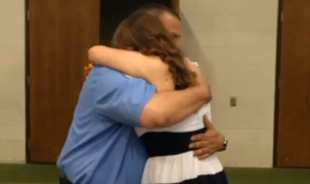 Man who saved abandoned newborn reunites with her at her graduation