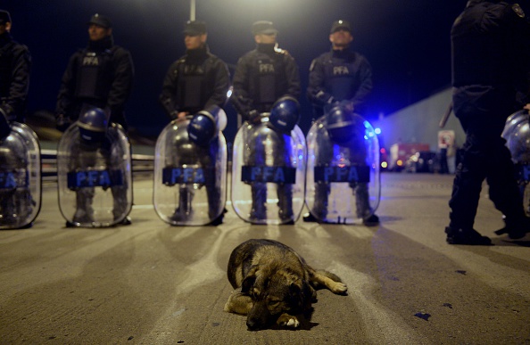 Policemen guard the Pueyrredon bridge in Argentina.