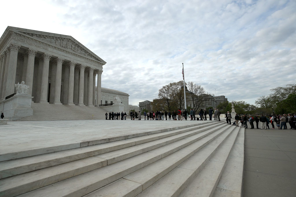 People wait in line to the Supreme Court
