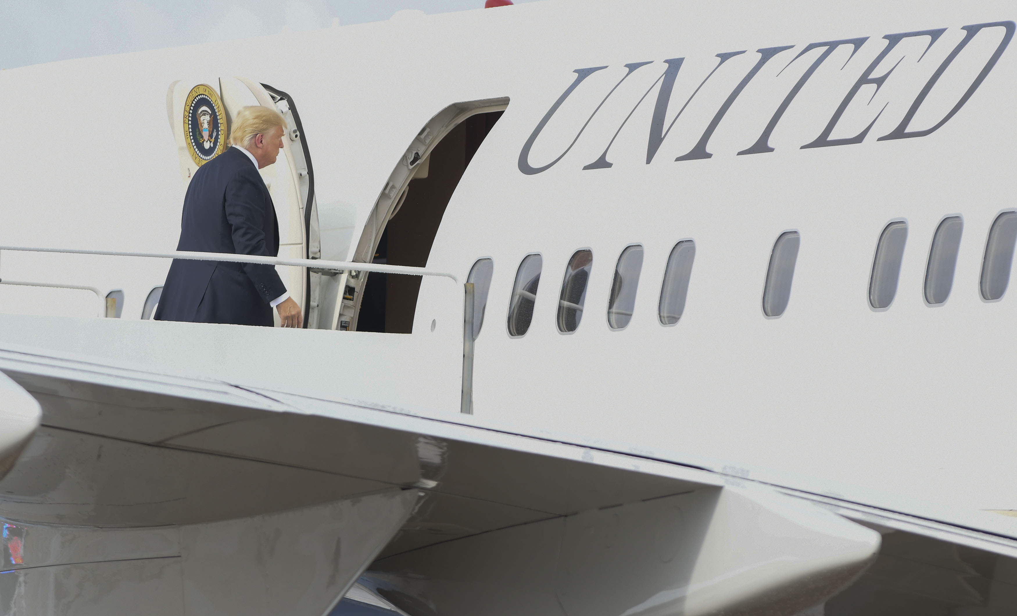 Trump entering Air Force One.