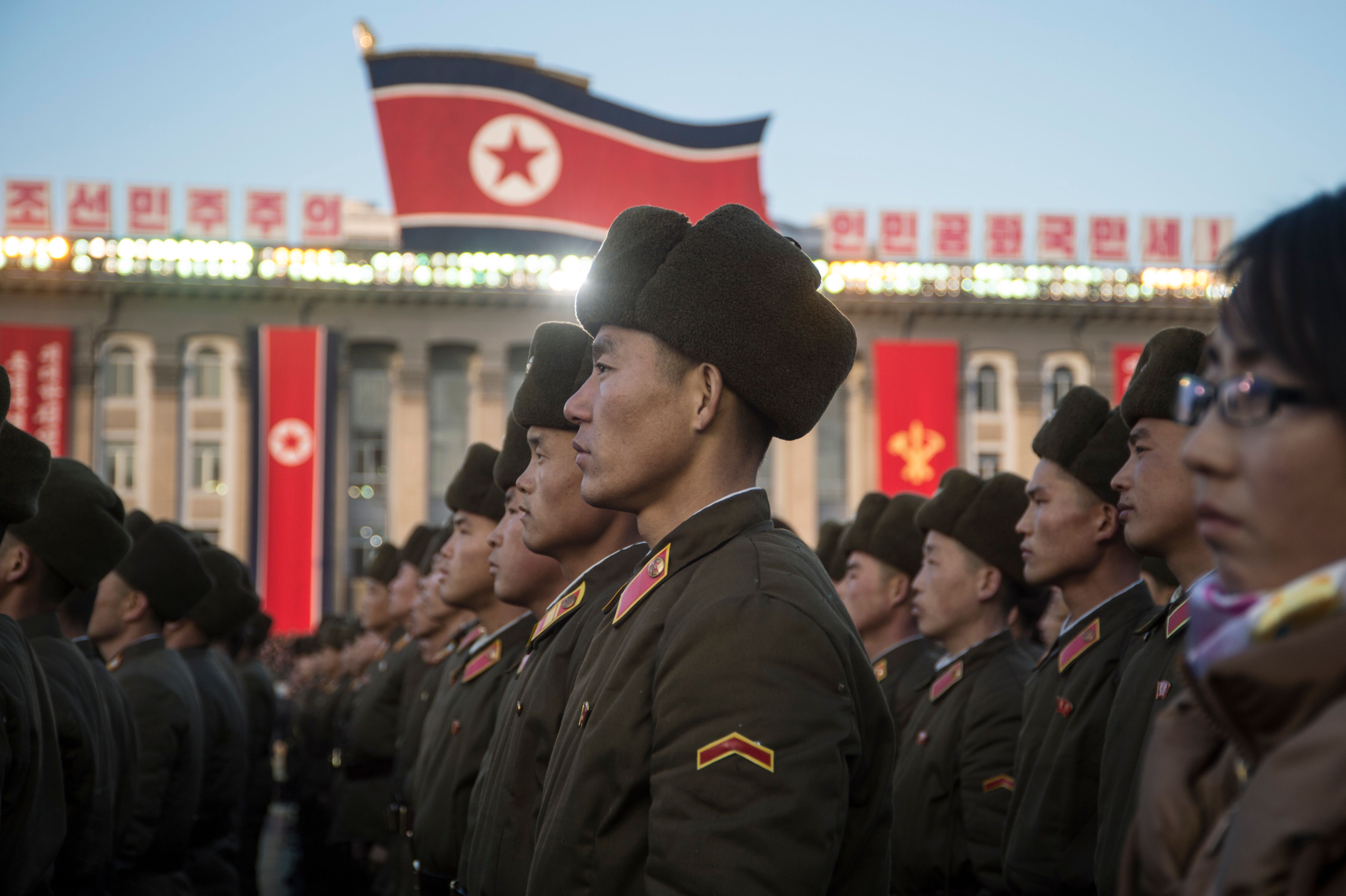 North Korean soldiers attending rally.