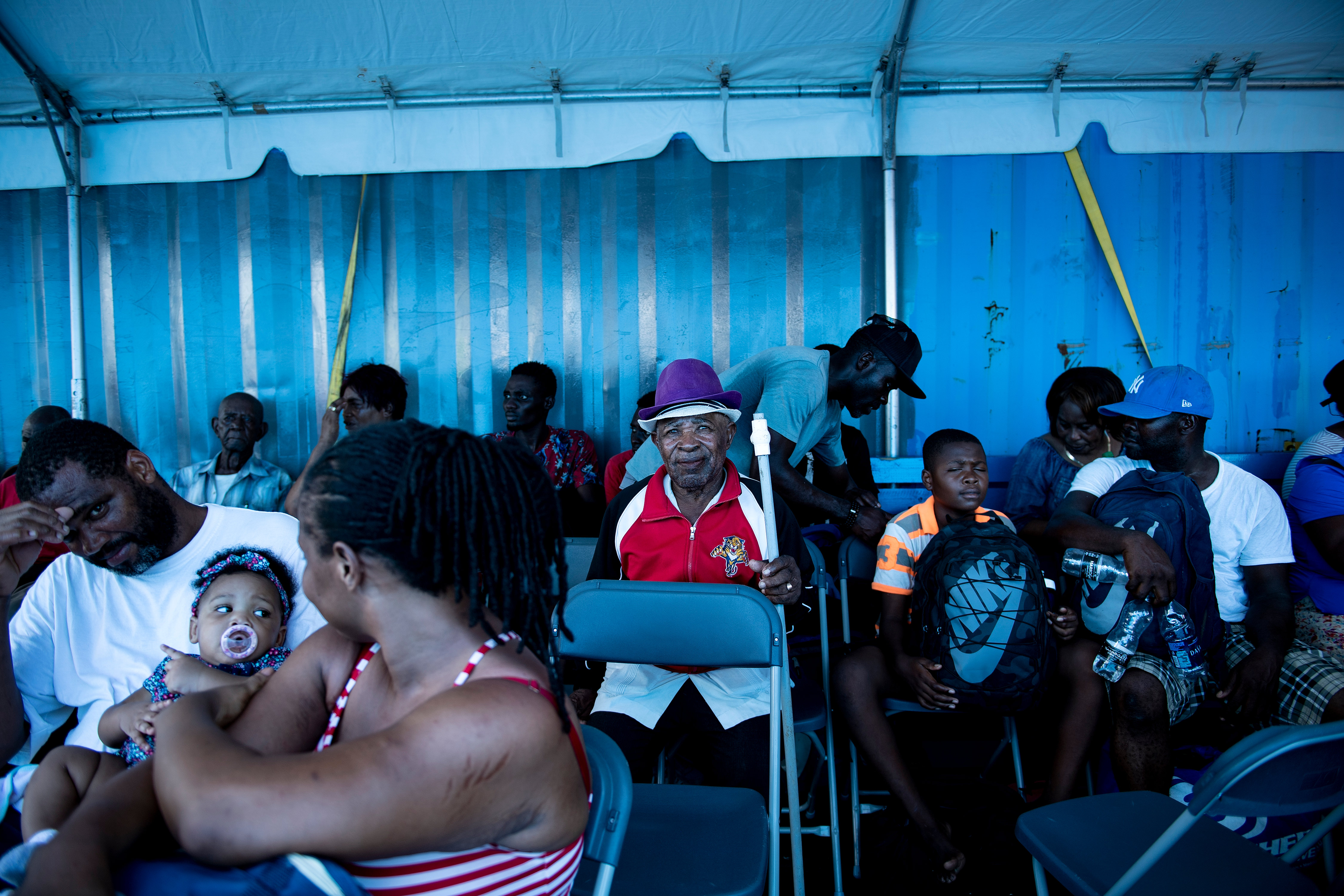 People wait to evacuate Marsh Harbor in the Bahamas.