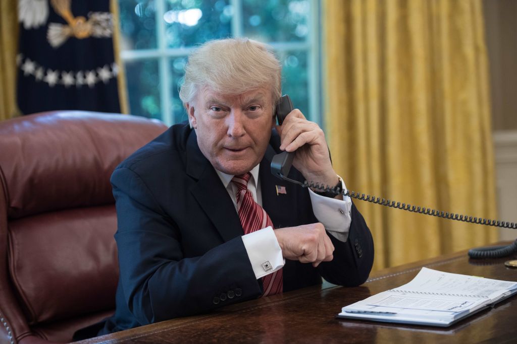 President Trump talks on the phone