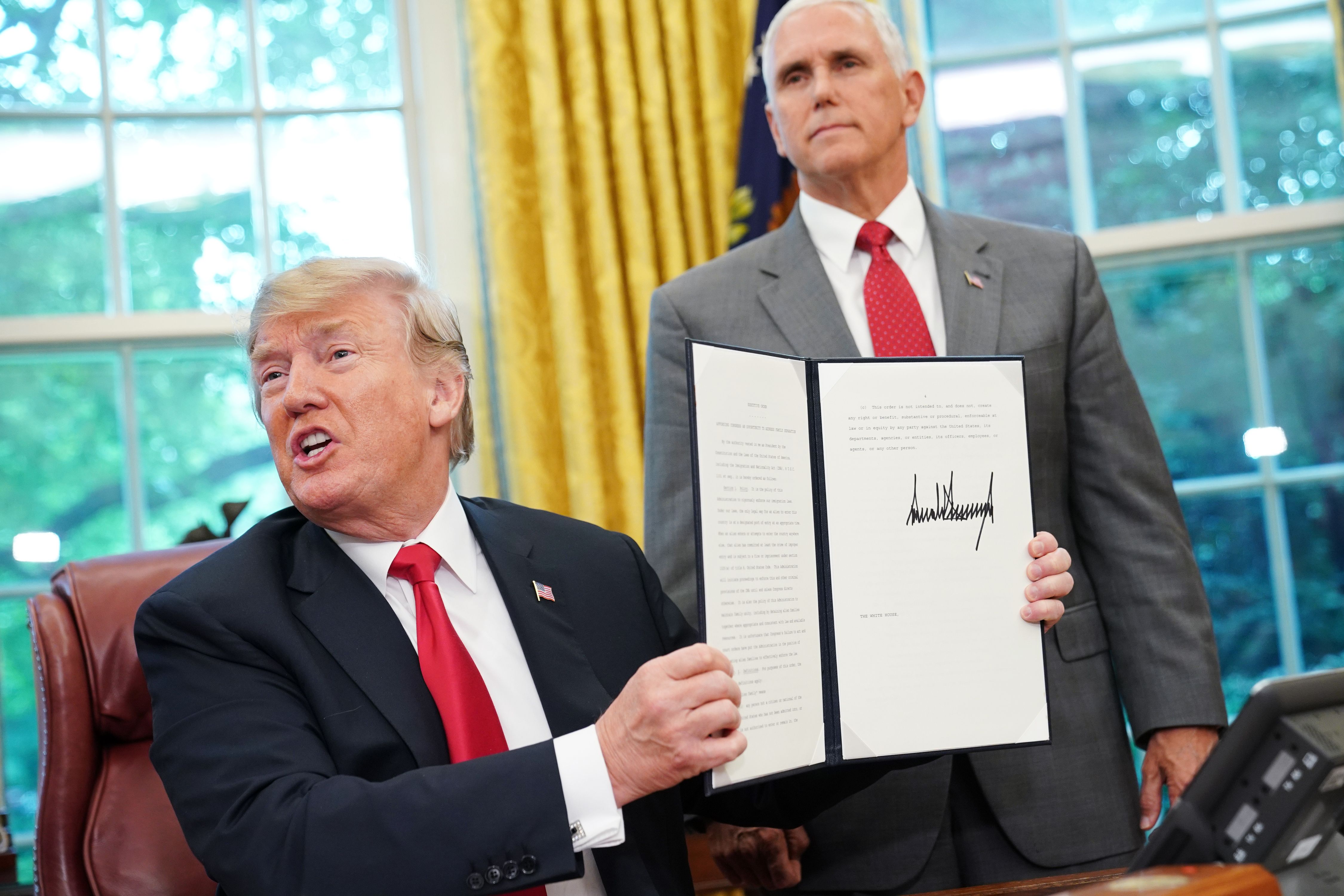 President Trump signs an executive order on immigration