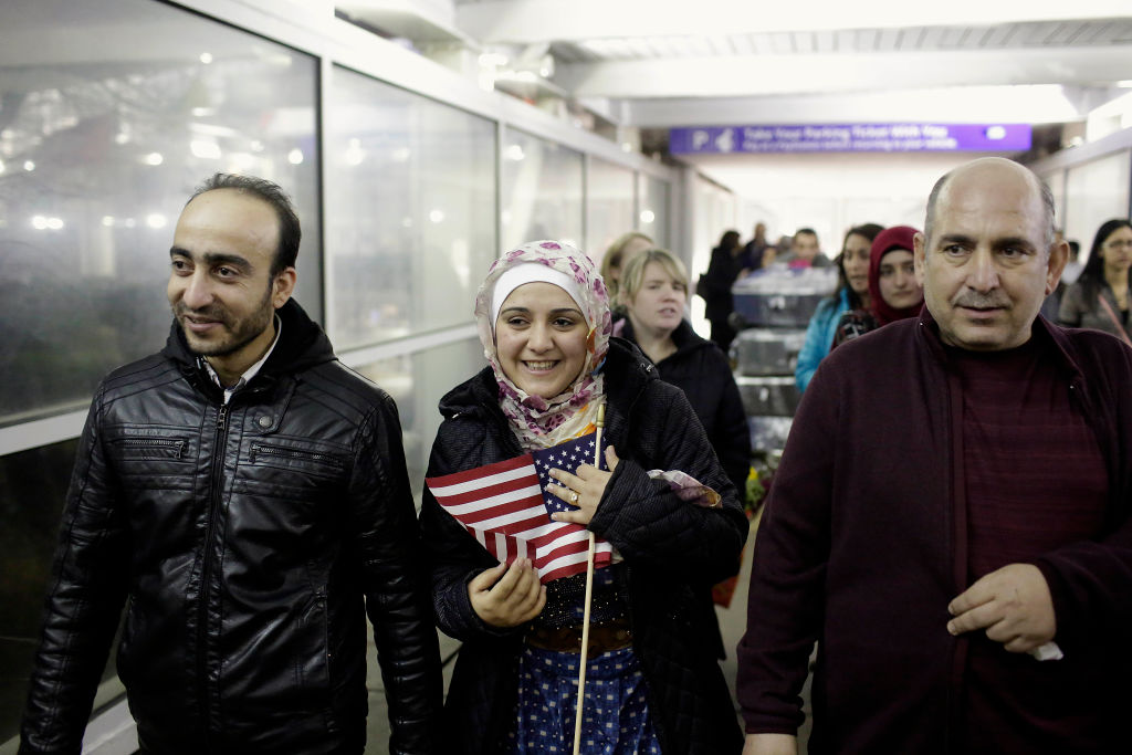 Syrian refugees arrive in the United States.