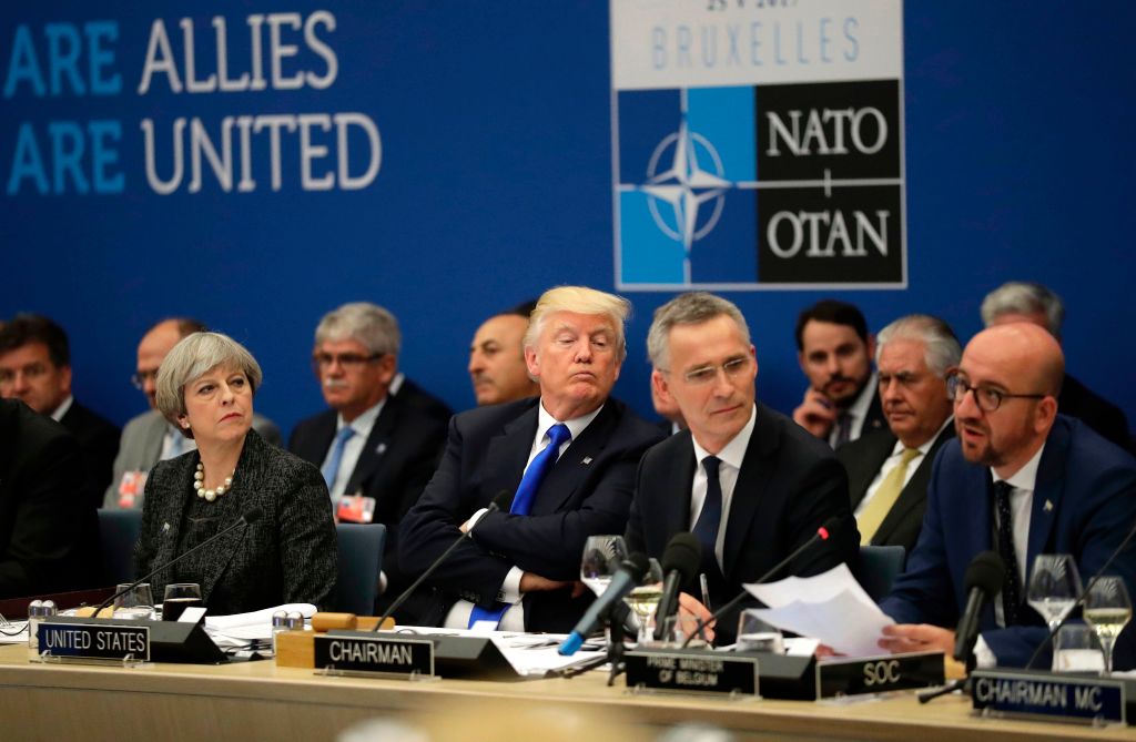 Trump sits with NATO members and leaders