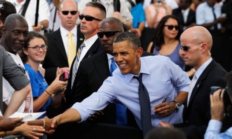 President Obama is guarded by agents as he greets supporters in Florida: The Secret Service scandal brings the entirety of the president&#039;s security into question.