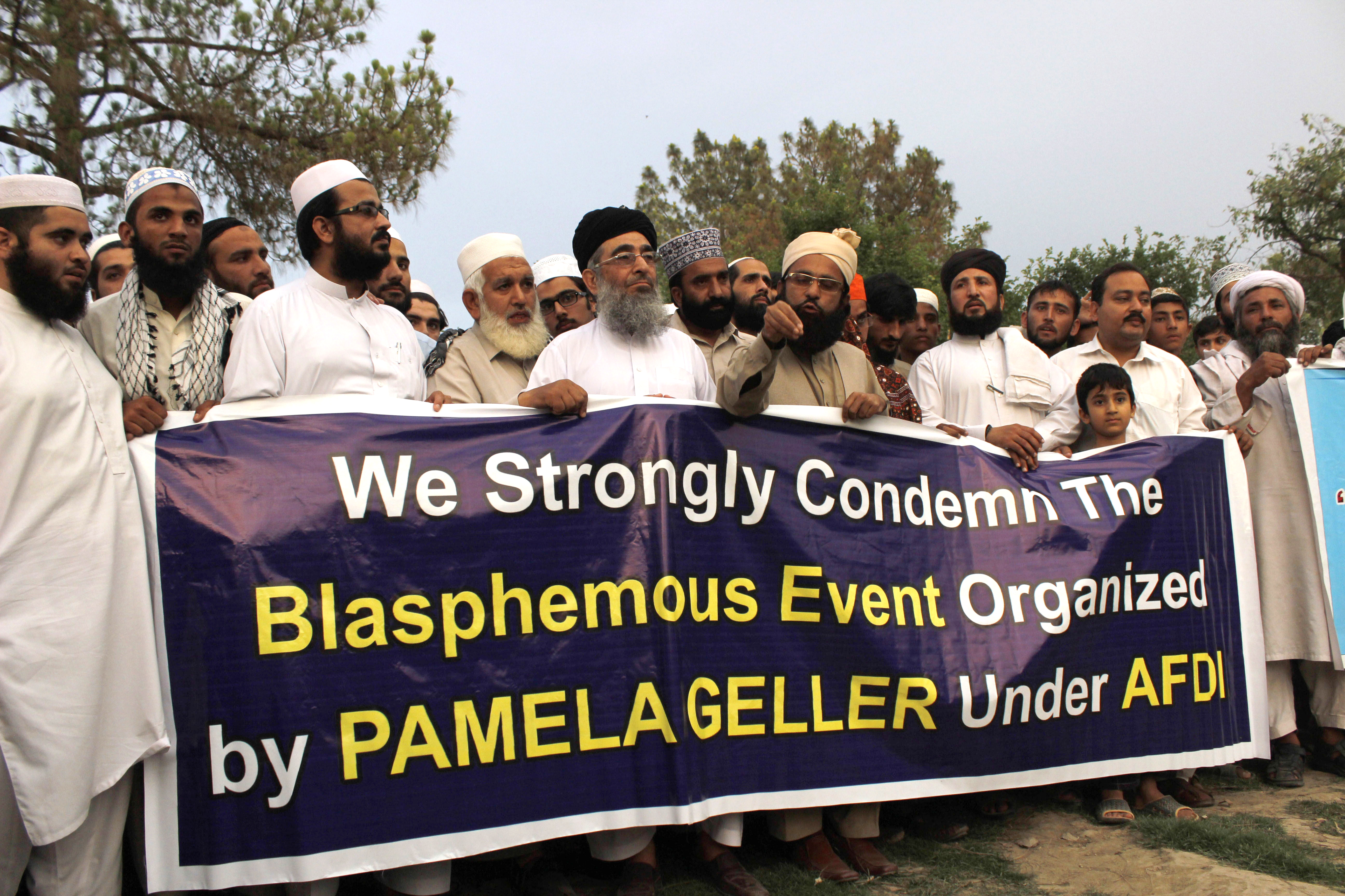 Pakistanis protest the event held by Pam Geller in Texas.