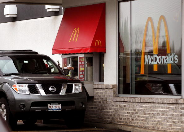 A McDonald&#039;s drive-thru window.