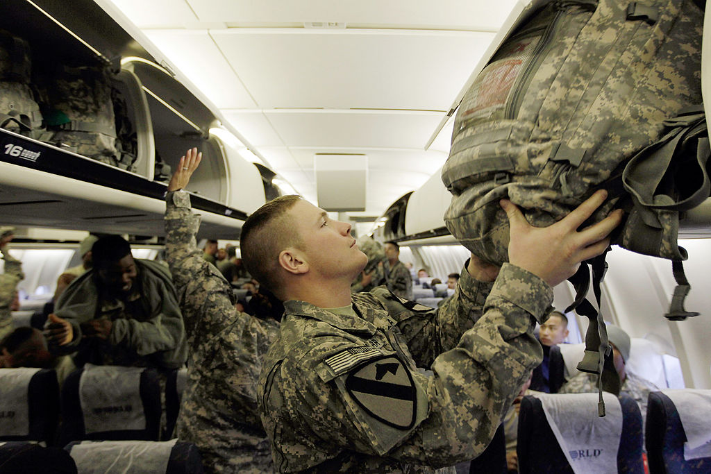 Soldiers flying home.
