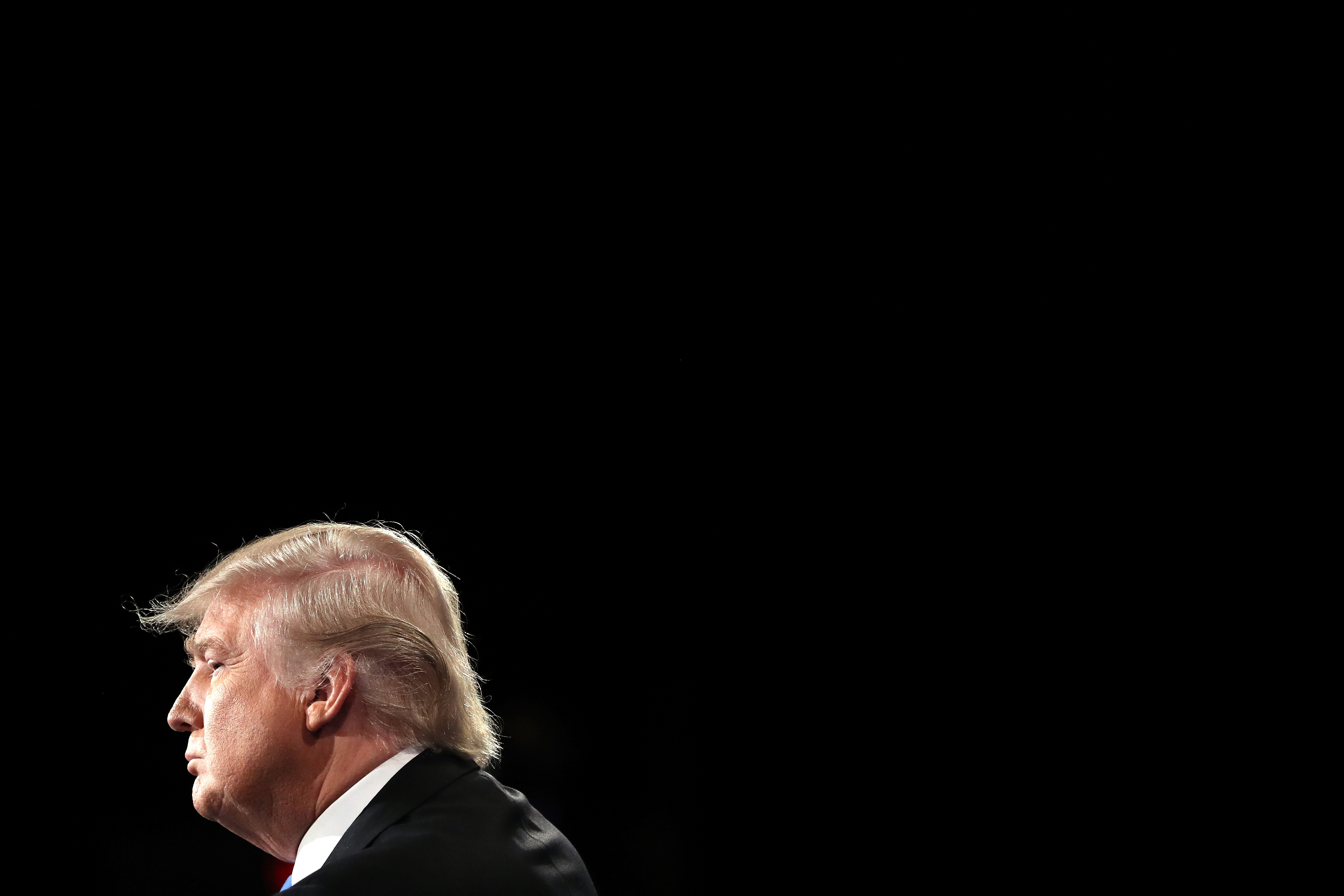 Donald Trump looks out over a crowd at a presidential debate