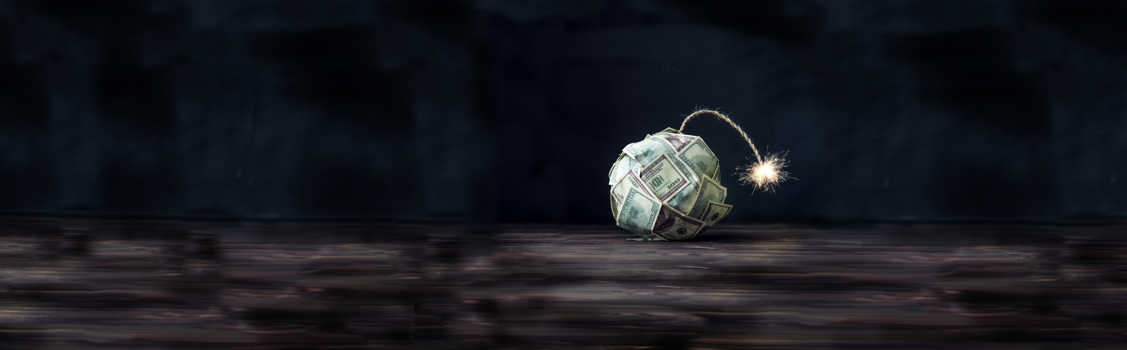 Bomb covered in money about to explode