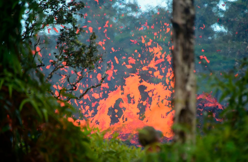 Lava is seen coming from a fissure in Leilani Estates subdivision on Hawaii&#039;s Big Island on May 4, 2018.