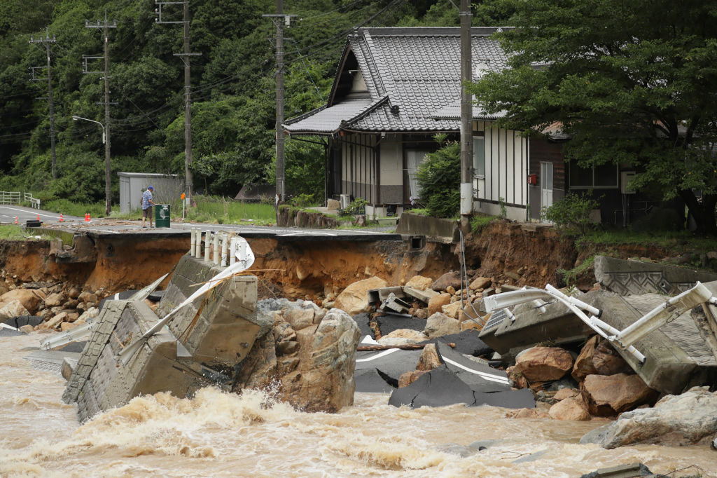 A collapsed road due to heavy rain in Higashihiroshima, Hiroshima prefecture on July 7, 2018.