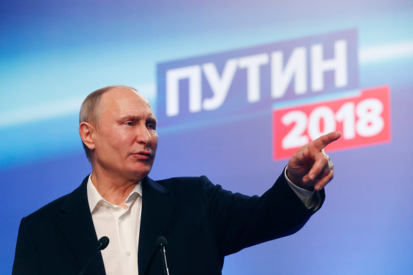 Putin wins reelection by a landslide.
