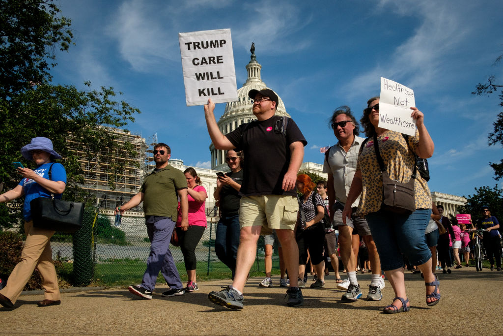 People protest the GOP health-care plan